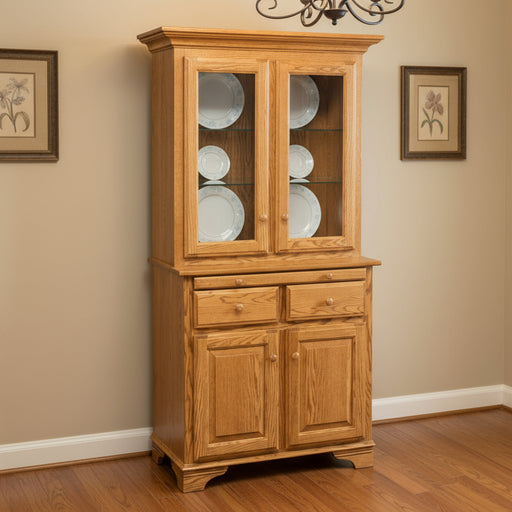 Amish 2-Door Mini Hutch w/Top
Hardware: 1.25" Wood Knobs
(2) Adjustable Glass Shelf in Top
(1) Adjustable Wood Shelf in Base.