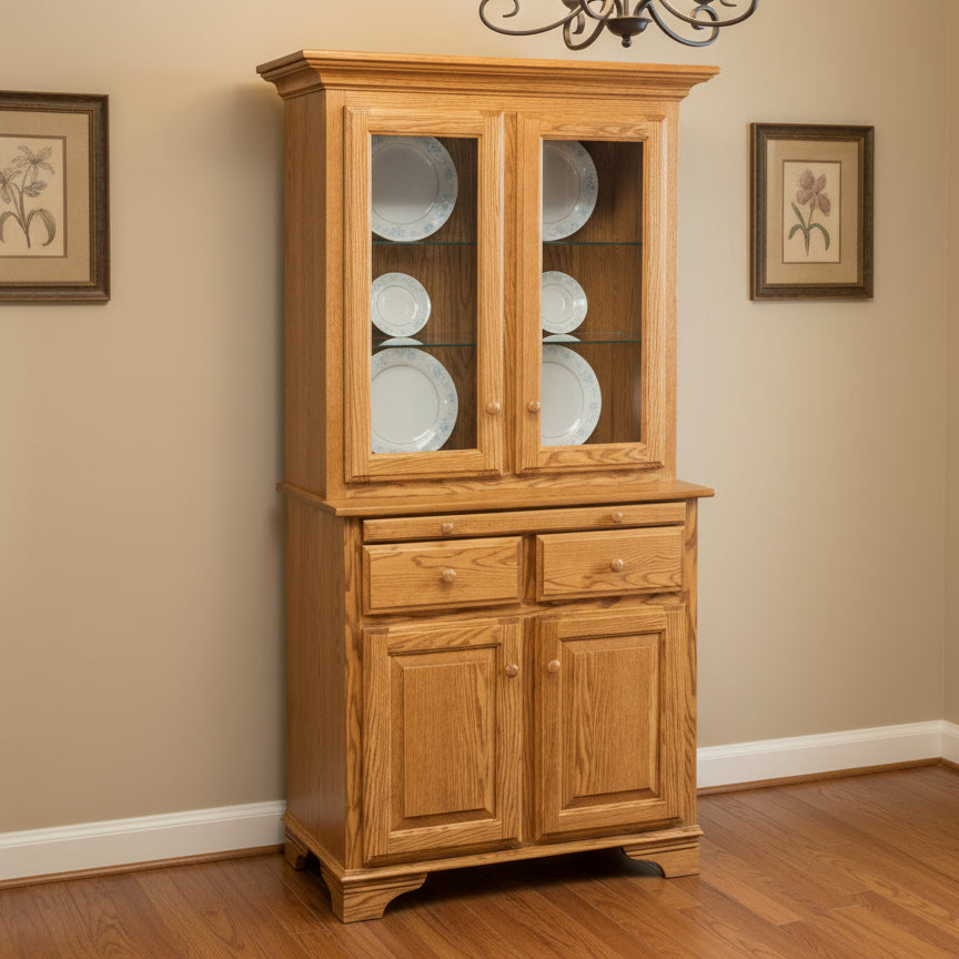 Amish 2-Door Mini Hutch w/Top
Hardware: 1.25" Wood Knobs
(2) Adjustable Glass Shelf in Top
(1) Adjustable Wood Shelf in Base.