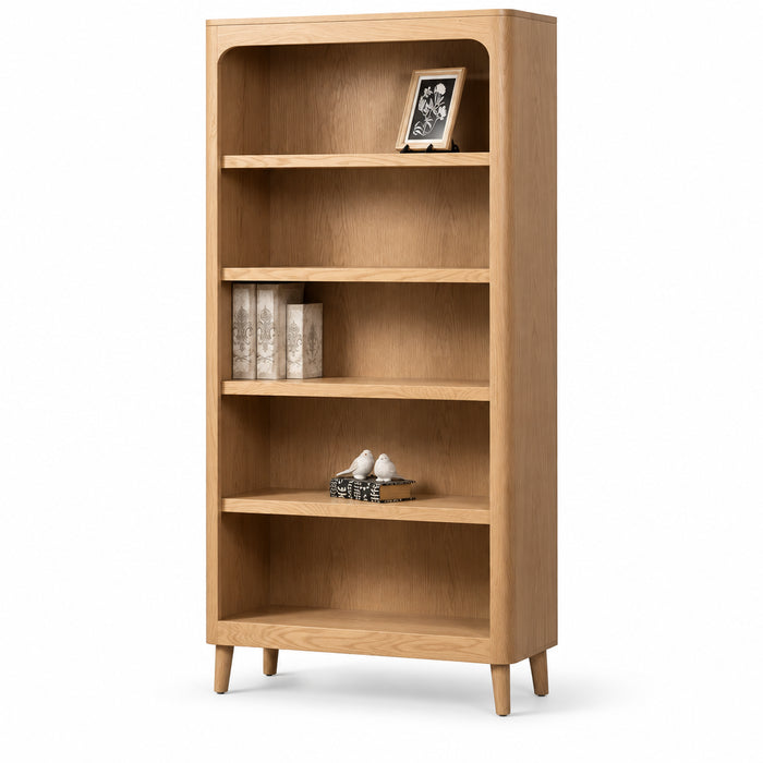 A tall, five-shelf wooden bookcase with a warm light oak finish and tapered legs, shown against a plain white background with decorative items on the shelves.