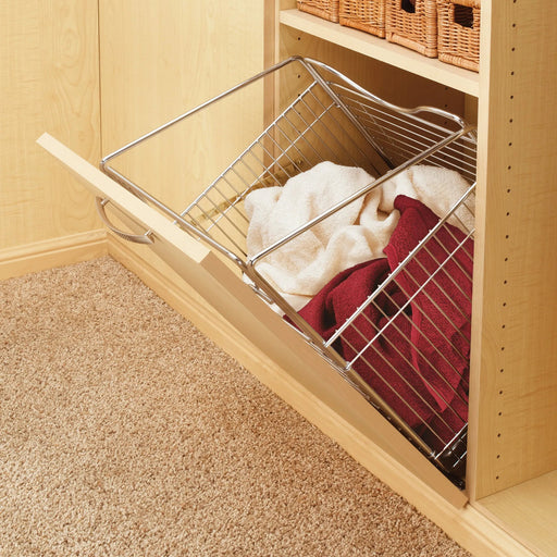 Closet with a wire basket filled with clothes, wooden shelves in the background.