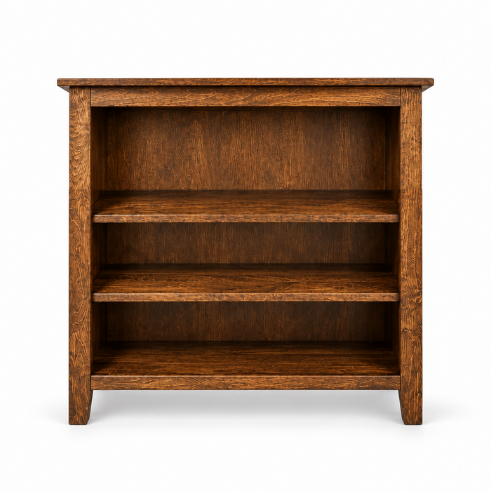A three-tier wooden bookcase with a warm medium-brown finish and visible wood grain, shown against a plain white background.