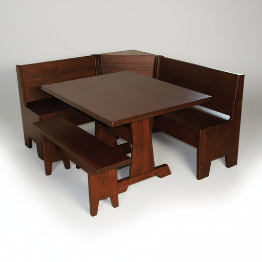A dark brown wooden corner booth table set with a rectangular table, two bench seats, and matching backrests, shown on a plain white background.