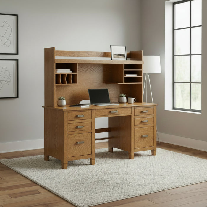 Wooden desk with shelves and a computer monitor on a white background