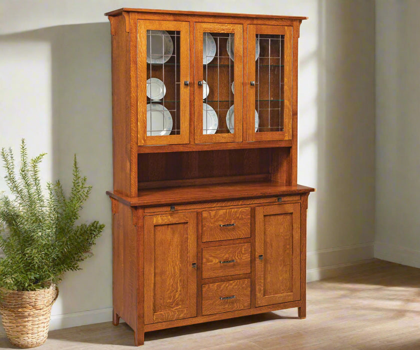 Amish Keiran 3-Door Hutch
Hardware: 910 SBN Knobs/ 910-96 SBN Pulls
Standard with LED Lights and Leaded Glass
2 Adjustable Shelves in Top and Base
Pull out Server Tray