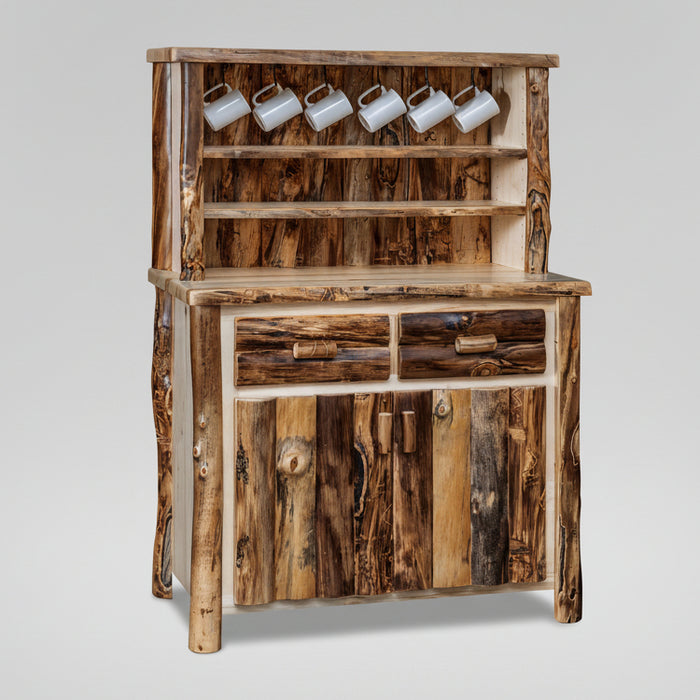A rustic wood hutch cabinet with a natural bark-edges finish, featuring a top shelf with five white mugs hanging from hooks, two drawers with wood-grain handles, and a lower cabinet door with vertical wood panels.