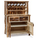 Rustic log-style hutch cabinet with a natural wood finish, featuring a top shelf with six white mugs, two drawers with rustic handles, and an open lower cabinet door showing shelving space.