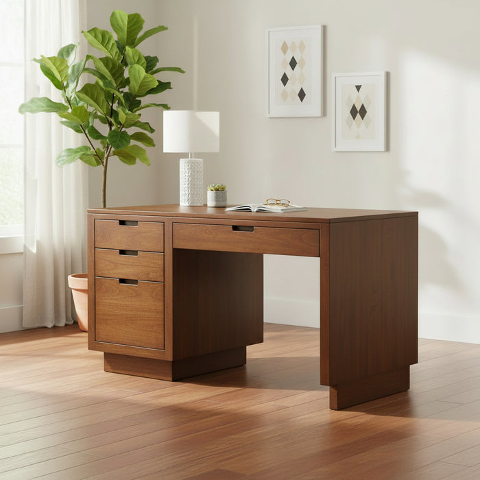 A mid-century modern wooden writing desk with a dark brown finish, featuring three drawers on the left, a single drawer on the right, and a wide open leg space, photographed on a light gray background.