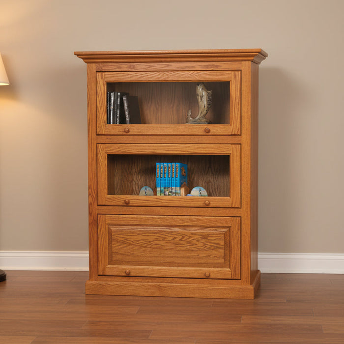 Amish Mission Barrister 40.5" One Piece 3 Door Bookcase
Traditional Raised Panel Doors
Ball Bearing Slides
Wood Knobs
Flat Glass