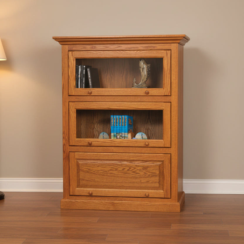 Amish Mission Barrister 40.5" One Piece 3 Door Bookcase
Traditional Raised Panel Doors
Ball Bearing Slides
Wood Knobs
Flat Glass