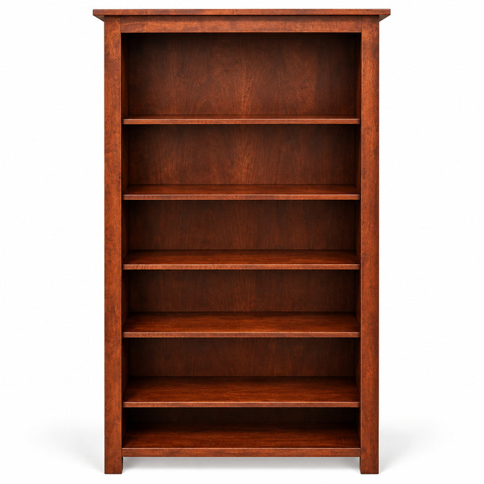 A tall, five-shelf wooden bookcase with a rich reddish-brown finish, photographed in a furniture store showroom.