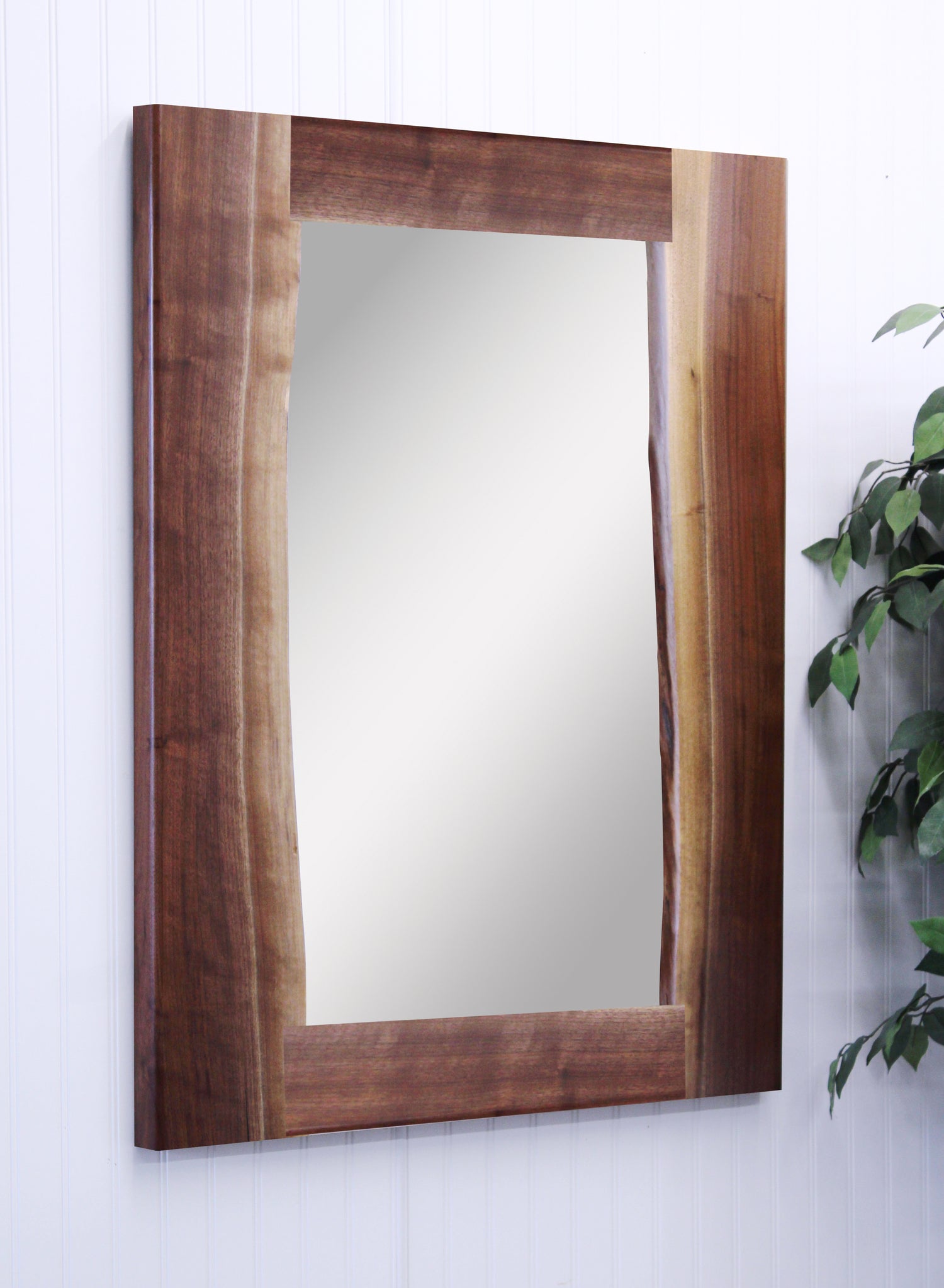 Amish River Run Live Edge Vertical Wall Mirror
Available in Walnut and Wormy Maple
Details Varies According to Grain Structure. Some may be smooth, others rough
Live Edge on Inside Toward the Mirror