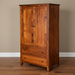 Wooden wardrobe with two doors and a drawer on a gray background