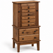 A rustic wooden chest of drawers with a two-tier design, featuring a top section with six drawers and a bottom section with three larger drawers, all with dark round knobs, set against a plain white background.