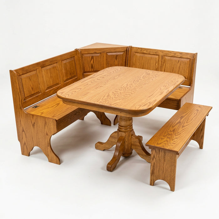 A wooden corner booth table set with a round pedestal table, a bench on the left, and a separate bench on the right, shown on a plain white background.