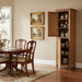 Wooden cabinet with open doors on a gray background