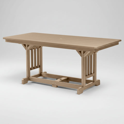 A rectangular outdoor patio table made of light brown composite lumber, featuring a slatted support design on the legs and a lower crossmember, shown on a white background.