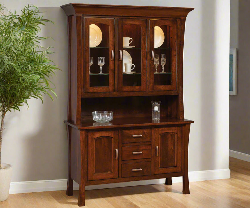 Amish Woodbury 3-Door Hutch
Hardware: K519-96 DBAC Pulls
(2) Adjustable Glass Shelves in Top
(1) Adjustable Wood Shelf in Base
Touch lights