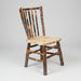 A rustic wooden dining chair with a light natural wood seat and back slats, and dark brown weathered legs and frame, shown against a plain white background.
