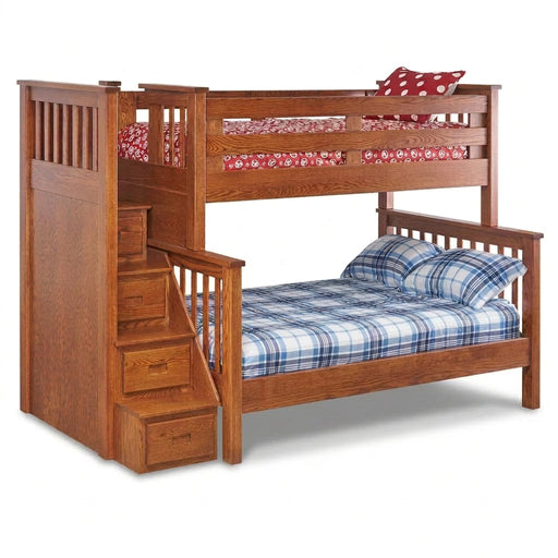 A wooden bunk bed with an attached staircase and under-bed storage drawers, shown on a plain white background. The lower bed is dressed in a blue and white plaid sheet and pillowcase, and the upper bed has a red and white floral patterned sheet and a red polka-dot pillow.